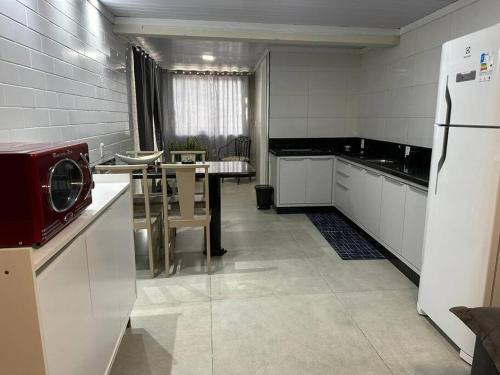 Carianos Apartment | Moradas Desterro, próximo ao aeroporto 01