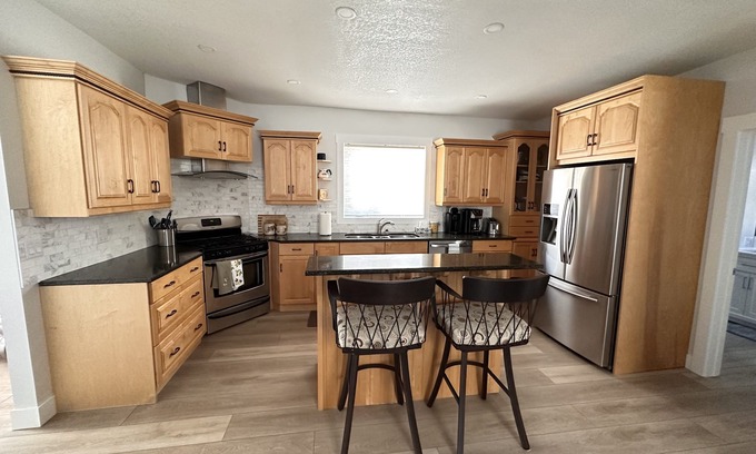 Blairmore House | Mountain getaway w/hot tub & heated garage