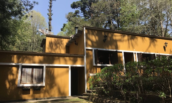 Campos do Jordao House | Mountain House with 5 suites amidst the woods.