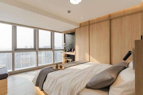 Bagumbayan Apartment | Muji Home Staycation in Eastwood Global Plaza