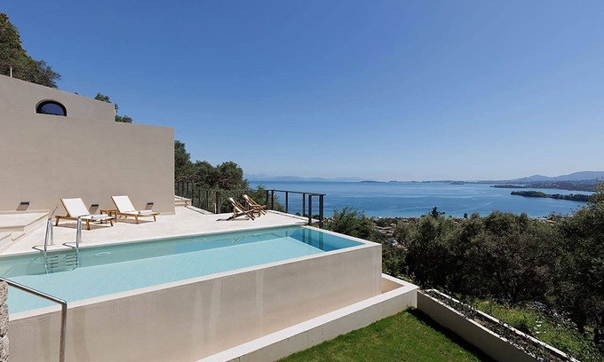 Afra Villa | My Rental Homes - Villa Garcia with infinity pool, equipped terrace and sea view.