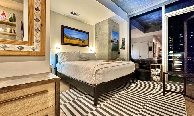 Rainey Street Historic District Apartment | Natiivo Sky Cottage king studio with balcony & rooftop pool
