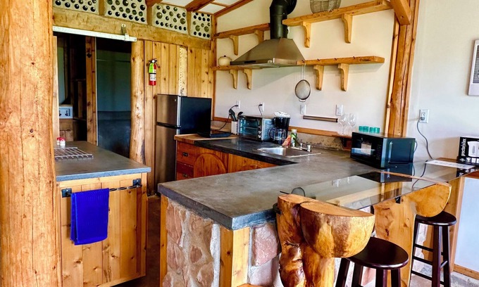 Cymbria Cottage | Natural Home Built in Earthship Style on Waterfront Property