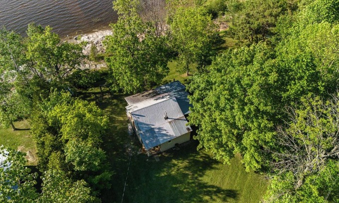 Whitewater Region Cottage | Nature Lover’s Dream – Riverfront Stay with Expansive Private Yard & Hot Tub