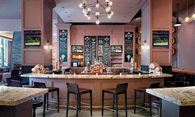 Downtown Hotel | Near Red Hat Amphitheater + Dining. Pool. Gym.