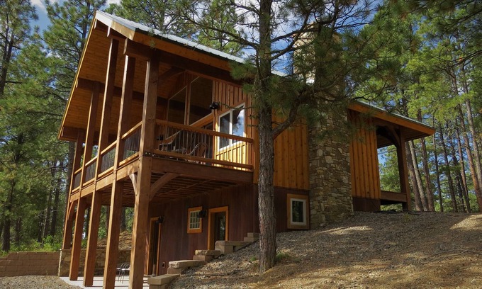 Pagosa Springs House | Nestled-in-pines, sooth-your-soul custom home with an incredible mountain view.