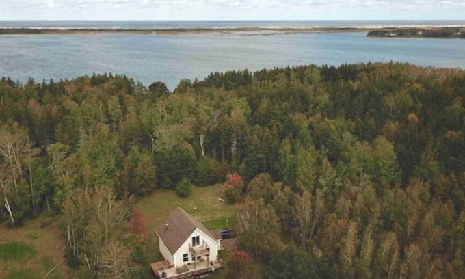 Brackley Beach Cottage | Nestled Woods by Brackley Beach