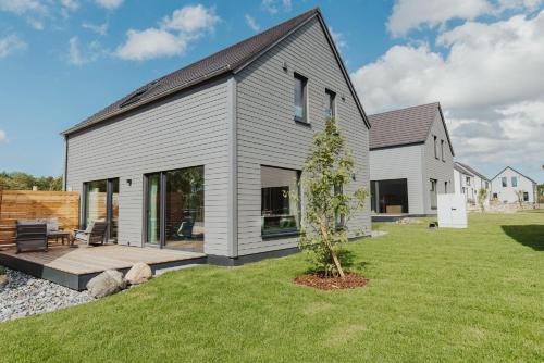 Sagard House | NEU "Rügen Resørt Sagard" großzügiges, gemütliches Familienhaus "Solveig" mit Terrasse
