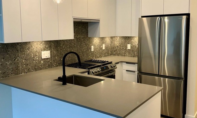 Willoughby Apartment | NEW 1 Bedroom and Den Condo with Balcony in the Heart of Willoughby Town Centre