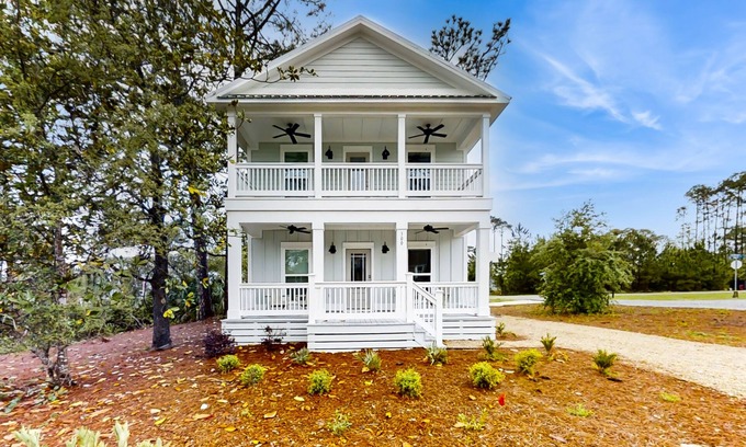 Carrabelle House | New dog-friendly home near beach & golf with pool, arcade game, decks, W/D, AC