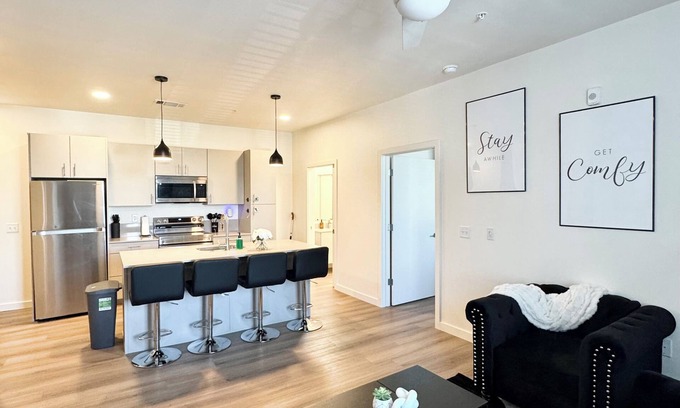 Central Oklahoma City Condo | New Downtown Luxury Apt 2 King Beds Free Parking Fast WiFi Pool & Gym