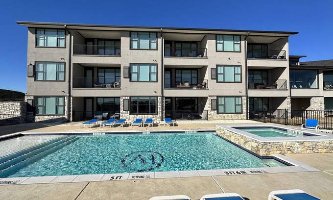 Graford Condo | NEW! First Floor Pool side PK Lake Luxury Condo - Hot Tub, FirePit, Gym, Laundry