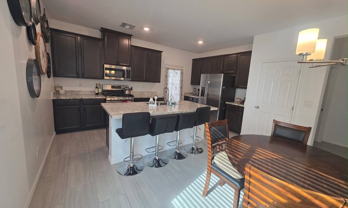 North Las Vegas House | New Gated Luxury: Modern gated 2 bed 2 bath home with soaking Tub, Patio, BBQ.