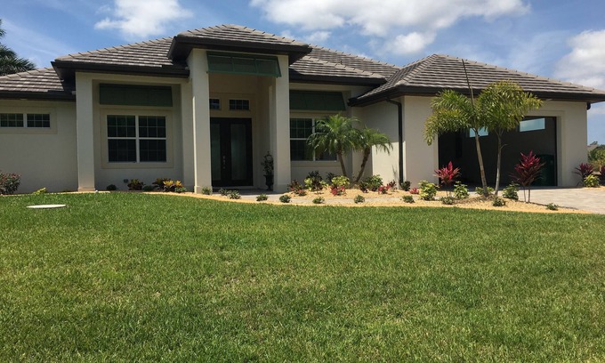 South Gulf Cove House | New gorgeous home on canal close to Gulf beaches