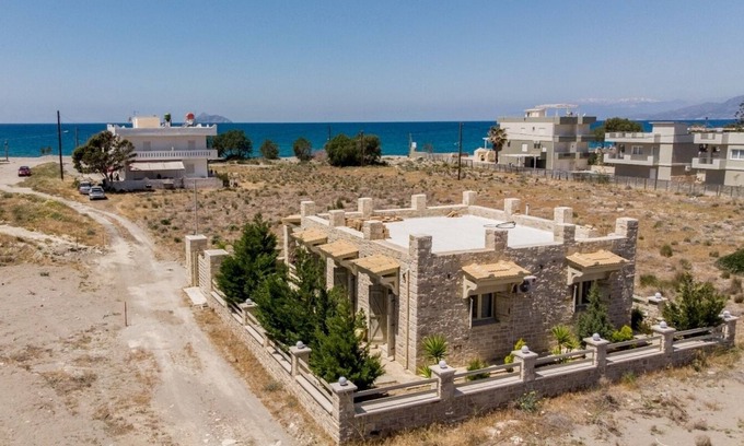 Neo Kalamaki House | New July 2020: Beautiful modern stone house, garden, on the beach