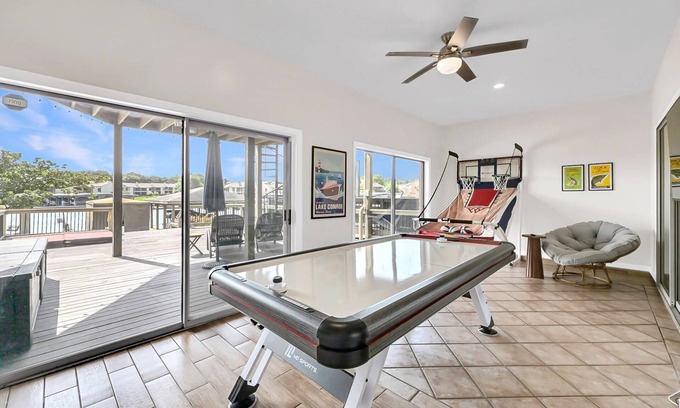 April Sound House | NEW! Lakeview 4BR Townhome | Spacious, Private Hot Tub, Game Room, Family-Friendly