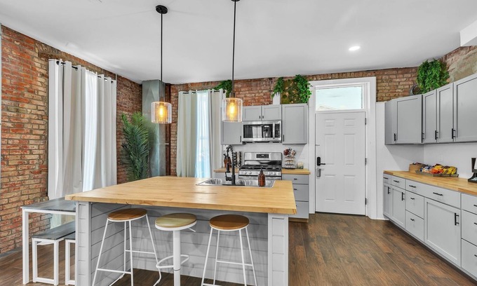 Northeast Kansas City House | NEW LISTING! BriKCtoria 1100 (5-Bedroom Home) - Pets Allowed