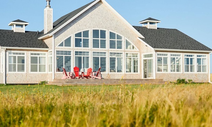 Anne's Land Cottage | NEW listing! Gorgeous oceanfront beach house with two master suites