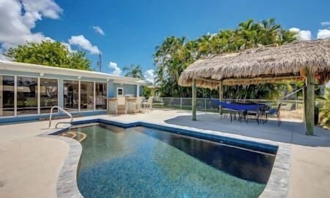 Fort Myers House | NEW LISTING! Heated Pool, Canal, Outdoor Bar, King Bed