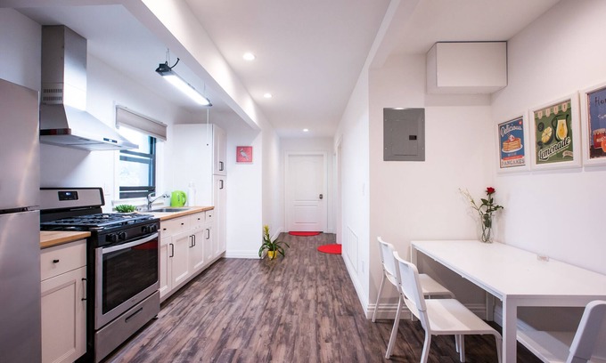 East Flushing Apartment | NEW! Luxury 4BD/4BA w/Rooftop Terrace & Outdoor Patio Kitchen