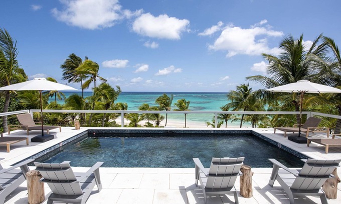North Palmetto Point House | New Luxury Beachfront Estate Home with Pool on Banks Rd