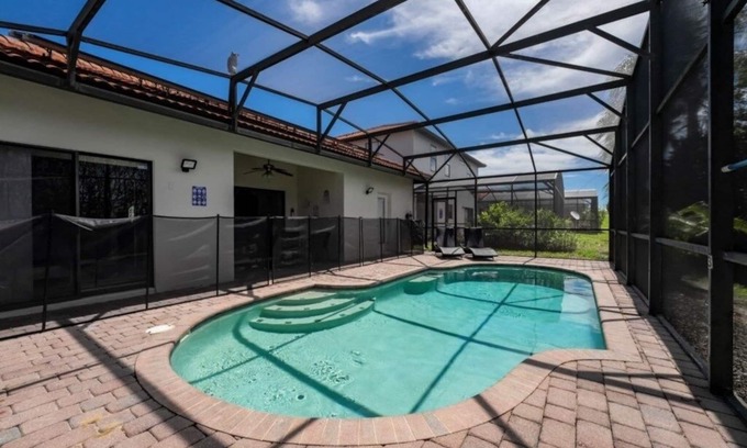 Four Corners Villa | NEW! Modern 4BR South Facing Pool Home Near Disney