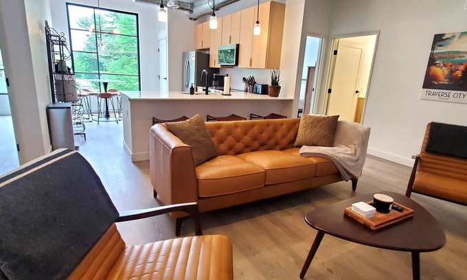 Traverse City Condo | NEW Modern Condo, King Beds, Rooftop Hot Tubs, Near Downtown, Quiet!
