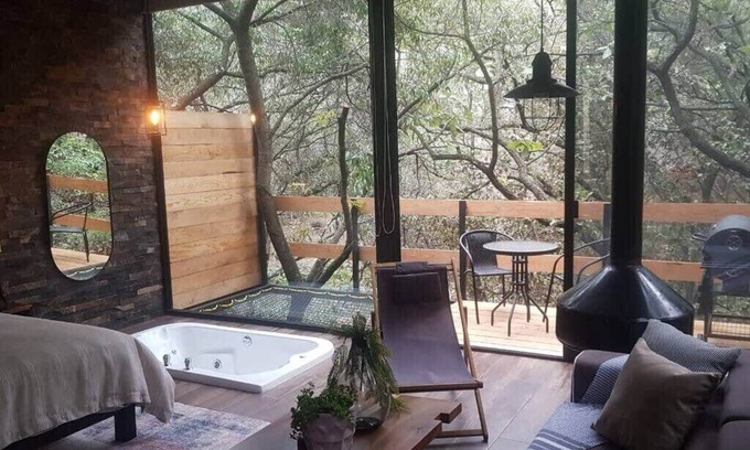 Zapopan Apartment | NEW! Romantic Forest Stay with Hot Tub, Deck & BBQ