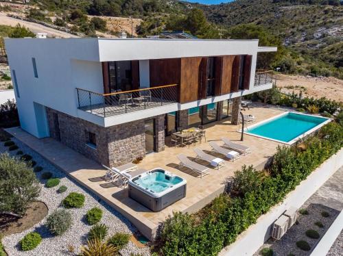 Primosten Burnji Villa | New! Seaview Villa Dolac with heated pool, a Hot tub, Finnish sauna and Billiards