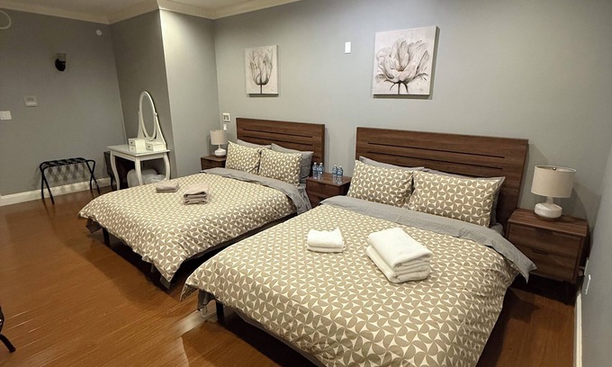 West Side House | Newly furnished family room3 with 2 queen beds, shared bath and common space