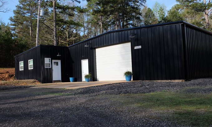 Russellville Apartment | Newly Remodeled Studio with huge garage space. Perfect for Boats, UTVs, & More