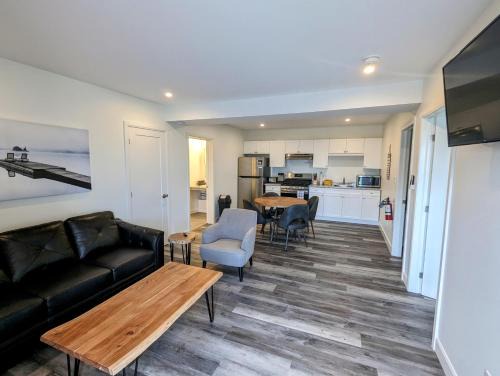 Drummond-North Elmsley House | Newly Renovated 2 Bedroom Beach Front Condo 2A