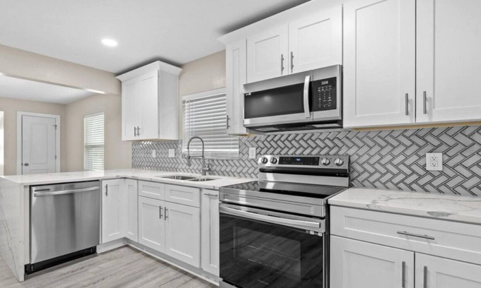 Toddville Road House | Newly Renovated 3-bedroom house nestled between the airport and uptown.