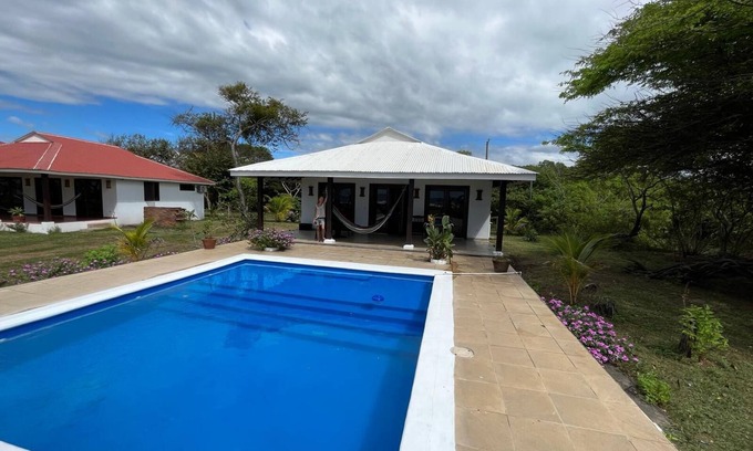 Leon House | Surf, Sun & Your Private Pool – 2BR Beachfront Escape