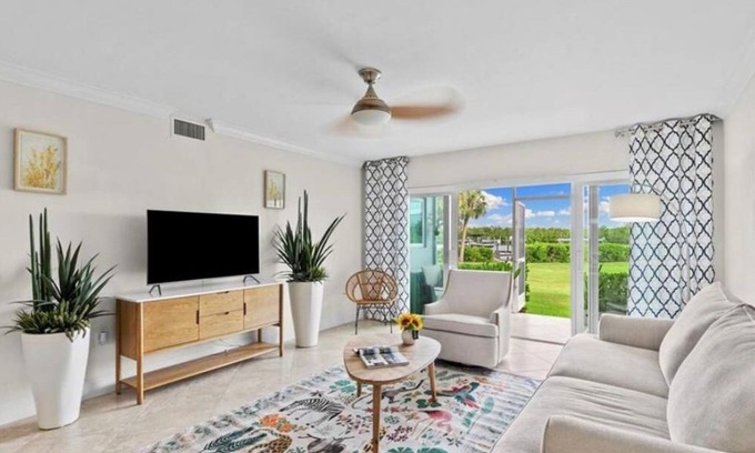 Redevelopment Area Condo | Nice 2-bedroom condo with AC in fabulous Naples with dock and pool ground floor!