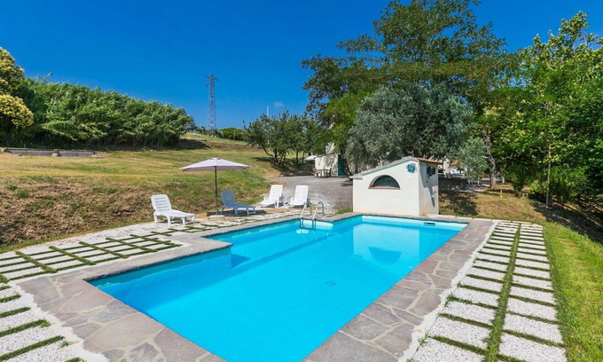 Rosignano Marittimo Villa | Nice apartment in villa for 10 guests with pool, TV, pets allowed and parking