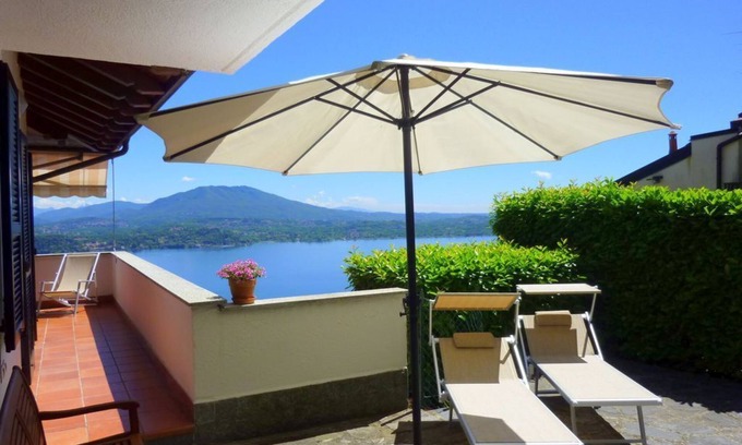 Carcioni Apartment | "NIDO SUL LAGO" exclusive Attiko with fantastic sea and panoramic views