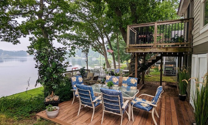 Solon Township House | No wake lakefront cottage with tiered decks and a quiet, friendly neighborhood