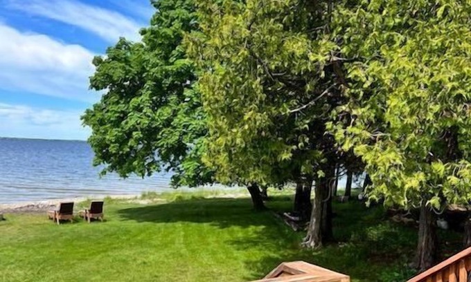 Escanaba Cottage | Noc's Landing: Autumn Bliss at Noc's Landing – Fall Colors & Cozy Vibes