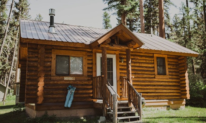 Seeley Lake Cabin | Nordic Cabin at Tamaracks Resort, a cozy log cabin with views of Seeley Lake.