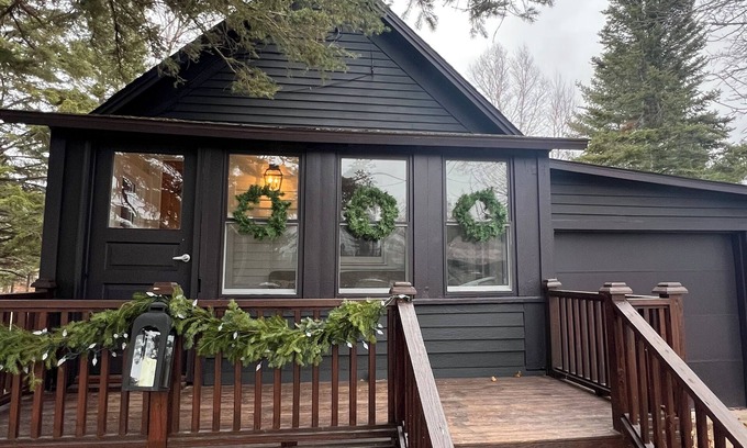 Laurium Cottage | NORTHERN LIGHTS! Historic Storybook Beach Cottage at Tamarack Waterworks