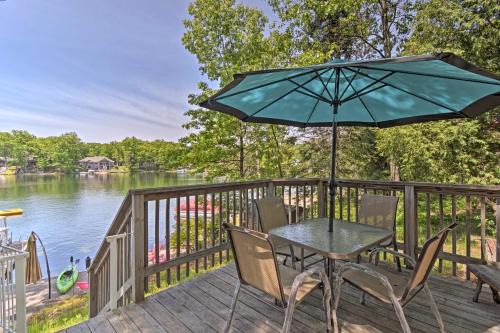 Lake George House | Northern Michigan Lake House with Boat Dock and Kayaks