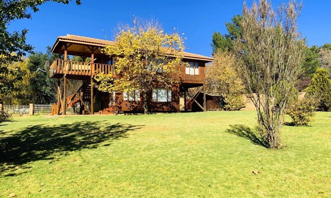 Clarens Cabin | Nougat Cabin. Luxury log cabin within walking distance of shops and restaurants.