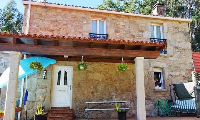 A Picarana Cottage | O Cobo. Rural house with garden and barbecue on the Portuguese Way. Pets allowed