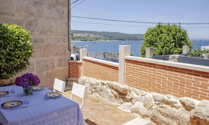 Cangas House | O Faro da Garita