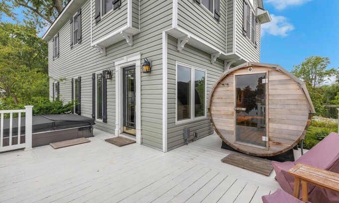 Wolverine Lake House | Oak Island: Waterfront Bliss with Hot Tub and Sandy Beach