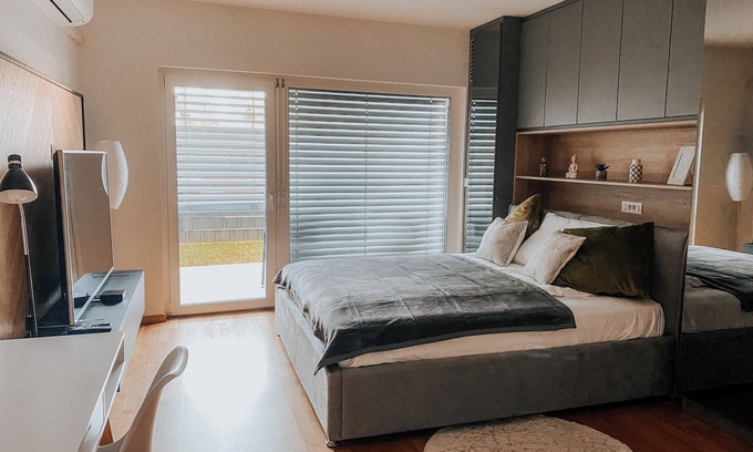 Ljubljana Apartment | Oasis of Energy - Sunny & Cosy Studio + Patio near AC, wifi, workspace