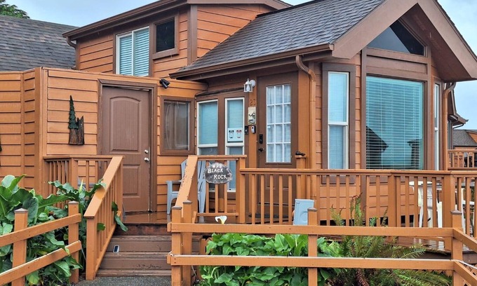 Smith River Cabin | Ocean Cabin 23 is a cozy seaside bungalow with loft, limited ocean views, and private beach. Hot tub temporarily unavailable