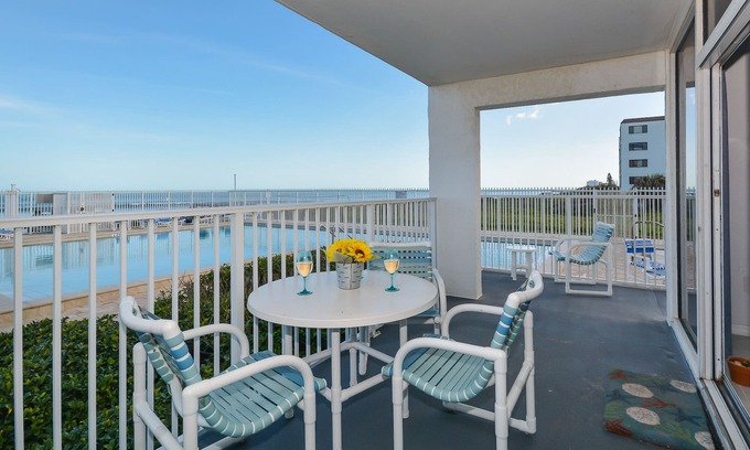 Bethune Beach Condo | Ocean Condo 104 ~ Ground Floor Corner Condo with wrap around balcony! Walk right out to Pool!
