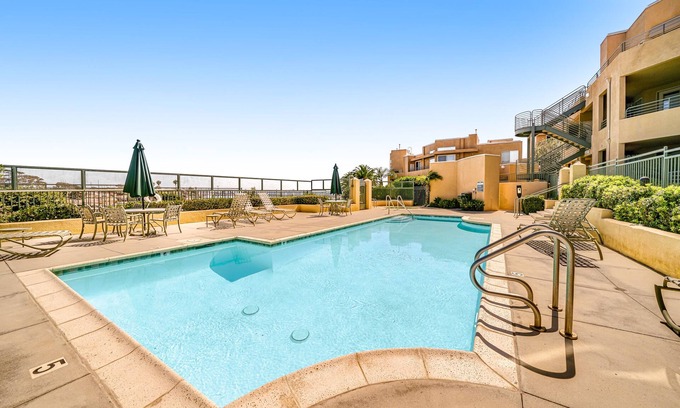 Carlsbad Condo | Ocean Pointe Getaway Coastal condo with ocean-view pool, private patio, grill, & AC - walk to beach